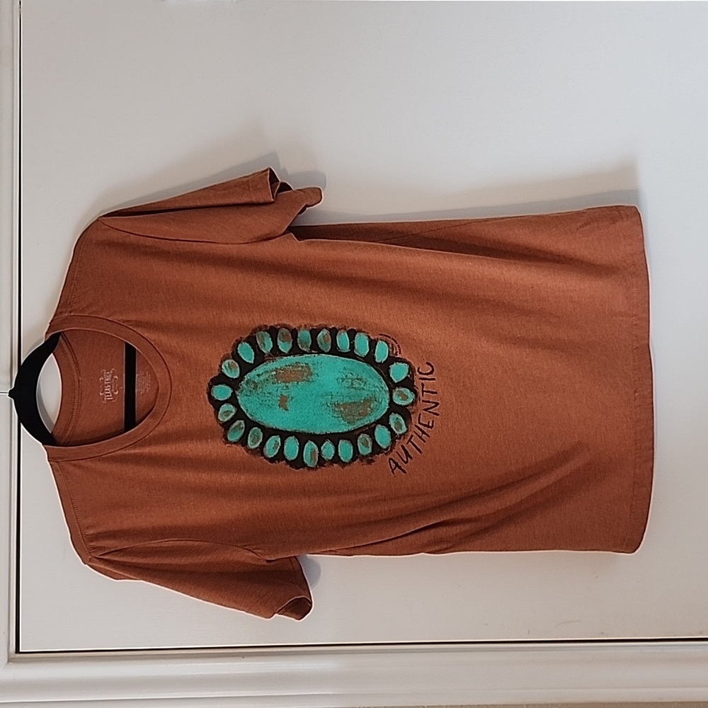Burnt orange southwest style t-shirt.Texas True brand